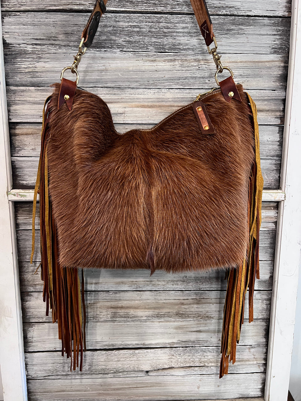 Caramel Cowhide Bighorn XL with 2 tone Fringe