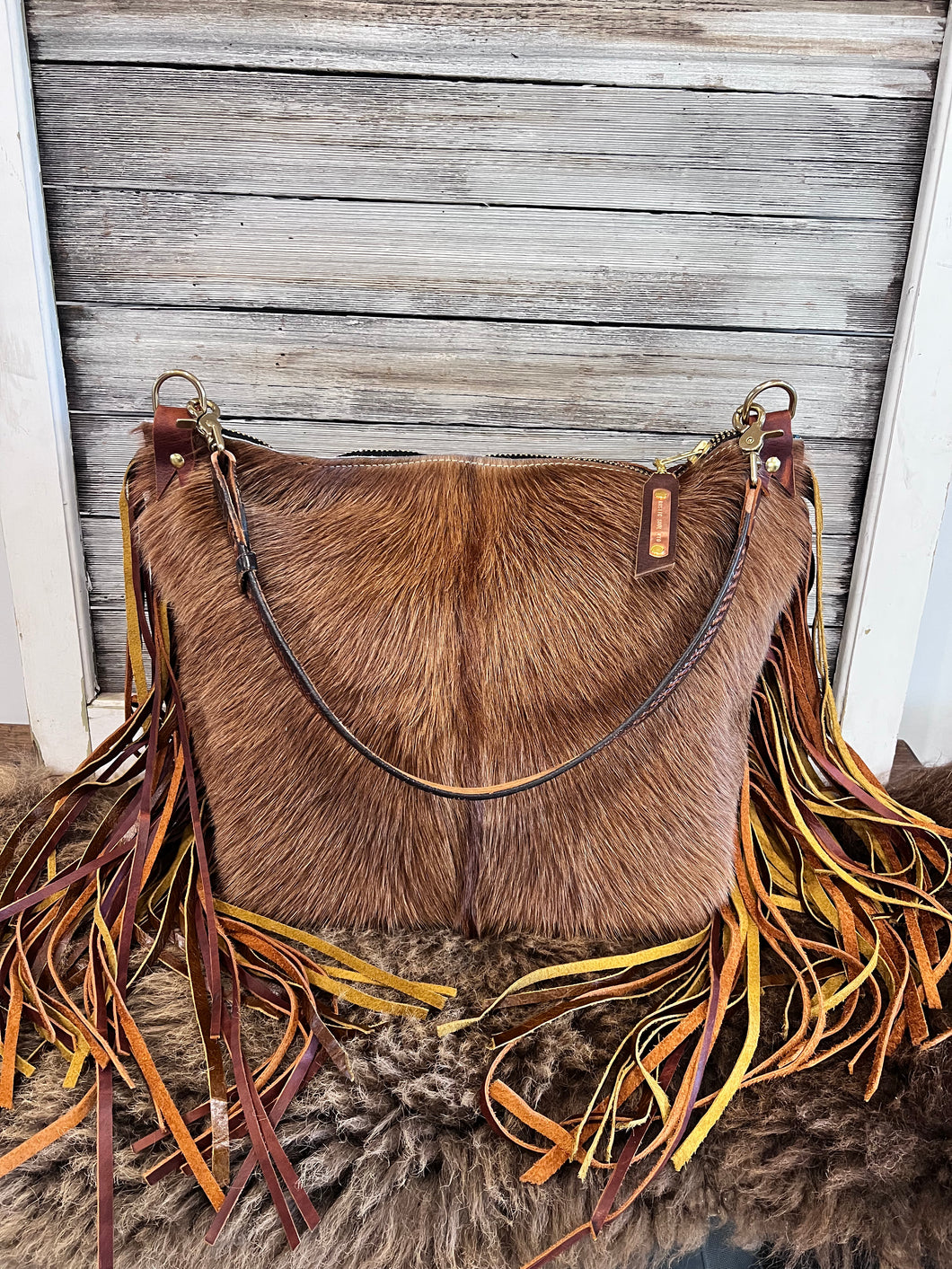 Caramel Cowhide Bighorn XL with 2 tone Fringe